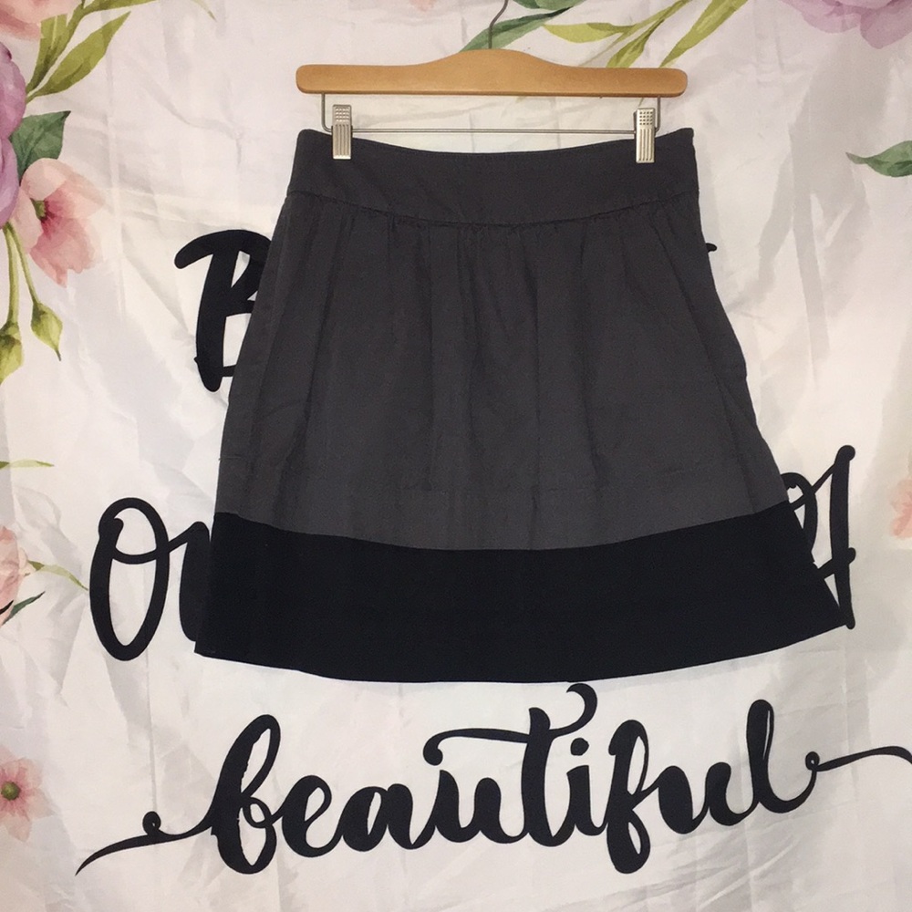 Gray with black skirt